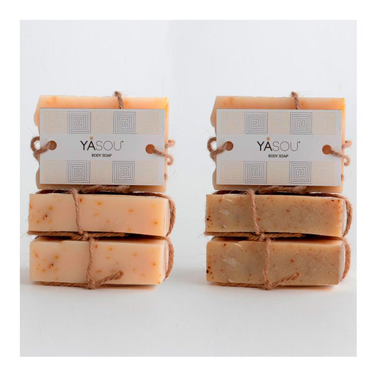 Body Soap:  3 with Bergamot & ylang-Ylang oils and 3 with Patchouli & Geranium Rose oils on a white background