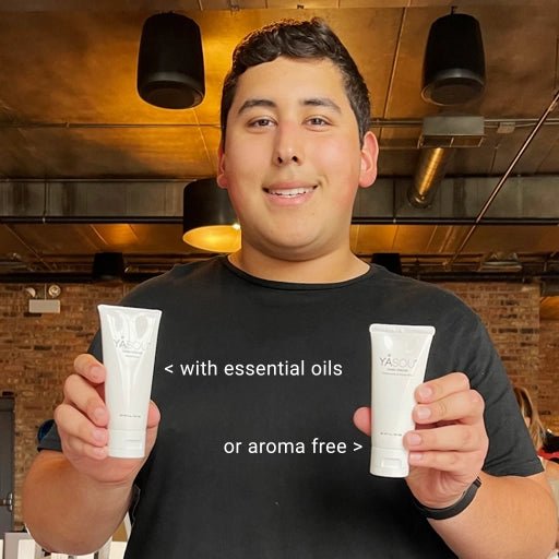 Real customer holding in one had YASOU vegan hand cream with essential oils and holding in the other hand the aroma free.