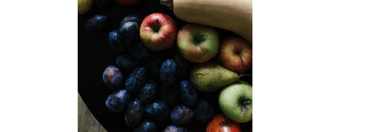 A close-up still life of autumn mixed fruit for YASOU's blog post called "Autumn Skin Transition: Your Seasonal Reset"