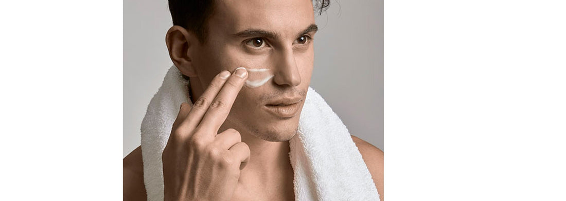 Close up of handsome man putting on face cream for YASOU's blog post called "The Basics: 101 Skin Care For Men".