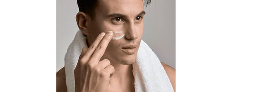 Close up of handsome man putting on face cream for YASOU's blog post called "The Basics: 101 Skin Care For Men".