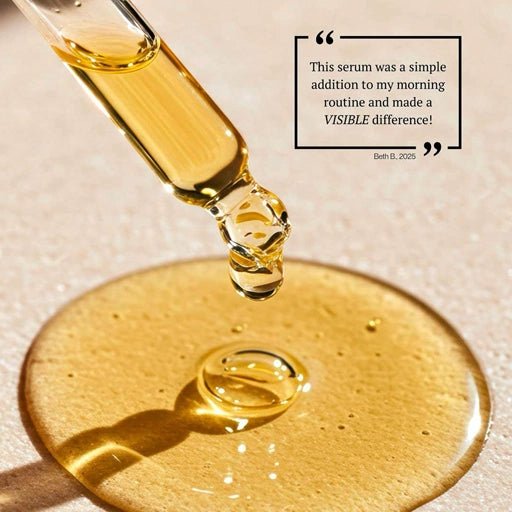 Gold serum dropper with serum on a beige background and customer testimonial.