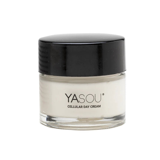 YASOU vegan day cream in a glass jar with a black high top cap on a white background.